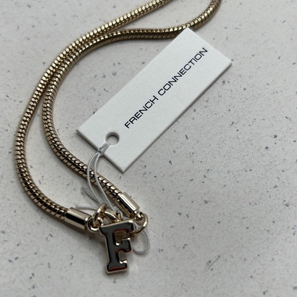 French Connection Brushed Gold Contemporary Necklace. - Picture 4 of 7